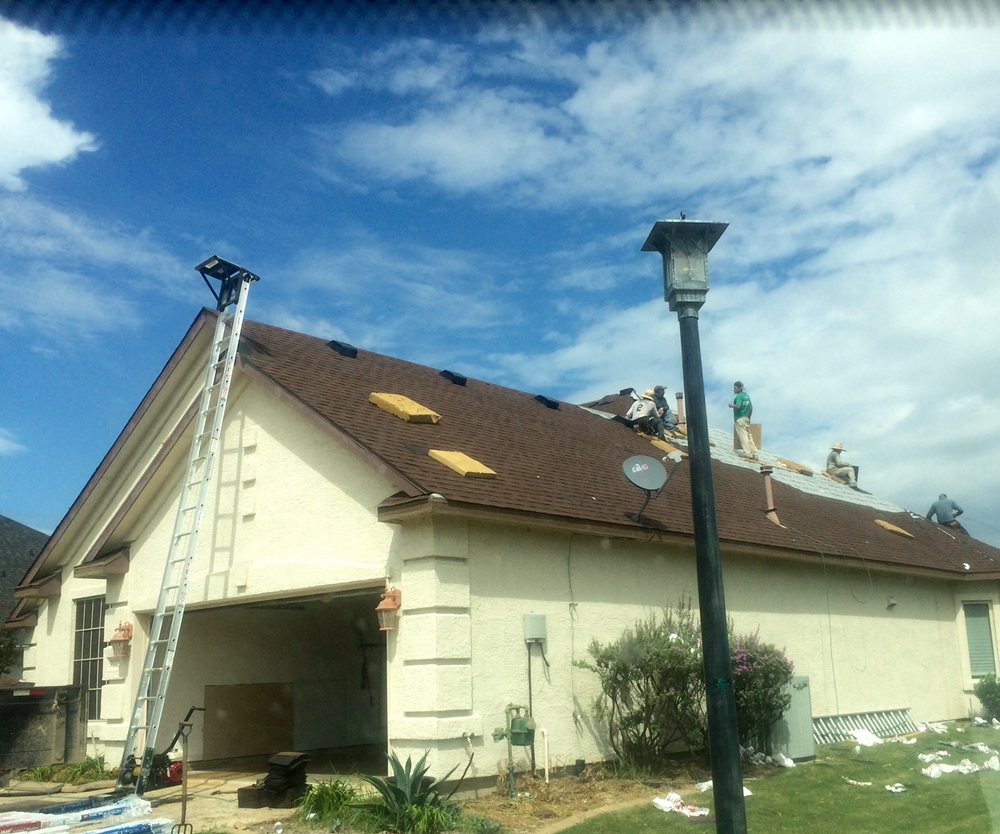 Slide of Bella Roofing & Construction