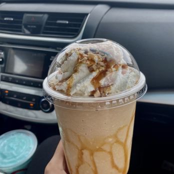 Olson House Coffee - a hand holding a cup of coffee - Coffee & Tea Near Me - Oroville, California
