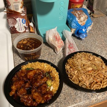 General Tao chicken with fried rice ,Chicken lo mein with fried rice, hot and sour soup and a egg roll.