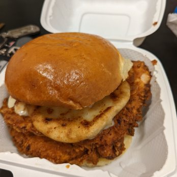 Queen Mother’s Kitchen - La Reina - Chicken sandwich with a house-made pupusa on top. - Sandwiches Near Me - Arlington, Virginia Queen Mother’s Kitchen - La Reina - Chicken sandwich with a house-made pupusa on top. - Sandwiches Near Me - Arlington, Virginia