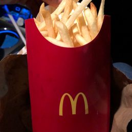 french fries in a red paper bag