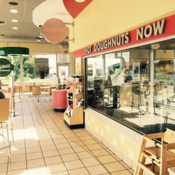 Krispy Kreme - Variety of SEATING in a CLEAN dining AREA.