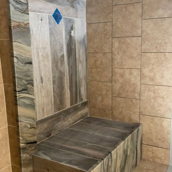 Pro Handz Renovation - a shower with a bench - General Contractors Near Me Pro Handz Renovation - a shower with a bench - General Contractors Near Me