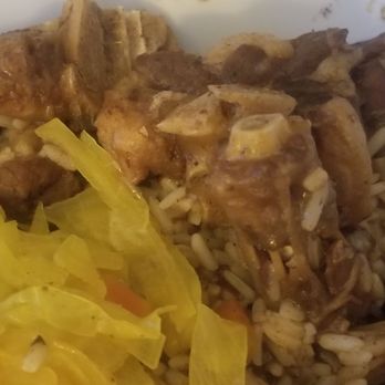 Ob's Jamaican Restaurant - Oxtail with Cabbage & Red beans & Rice and a side of coco bread - Caribbean Near Me - Chester, Pennsylvania