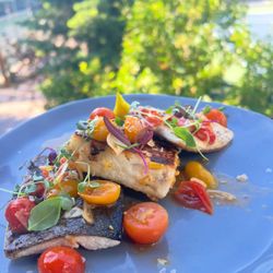 Rocky Mountain Trout with white corn polenta cake, tomato escabeche