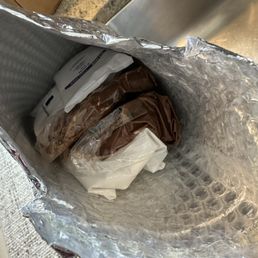 How my Palm Bites chocolate bars arrived. I received the package direct from courier and opened it right then and saw this. How my Palm Bites chocolate bars arrived. I received the package direct from courier and opened it right then and saw this.