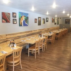 Little Blue Joint - Eat Here!!.  There  is ample seating,  From  a simple high back booth, a table, or seating at the bar. Eat here.