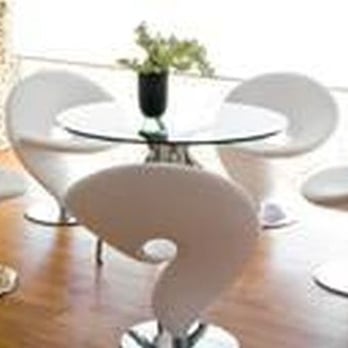 Abstract Floor - a dining room with white chairs and a glass table - Flooring Near Me - Canoga Park, California
