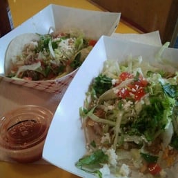 Grilled fish and shredded garlic beef tacos Grilled fish and shredded garlic beef tacos