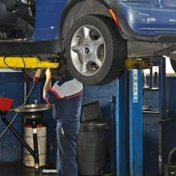 Car Care Specialists - Shop at work