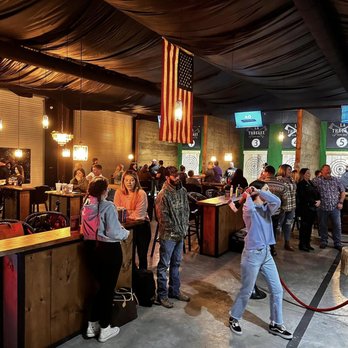LA Threaux - a crowd of people in a bar - Axe Throwing Near Me - Gonzales, Louisiana LA Threaux - a crowd of people in a bar - Axe Throwing Near Me - Gonzales, Louisiana