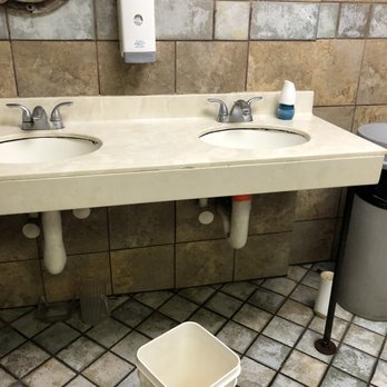 Captain Jim's Seafood Buffet - Women's bathroom-yet another leak and water on the floor. Heard the men's bathroom had a large ceiling leak also. - Seafood Near Me - Pigeon Forge, Tennessee