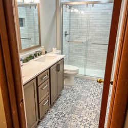 Carpet Weaver's Flooring & Furniture Gallery - Finished project at Carpet Weavers -- bathroom floor tile and wall tile