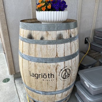Lagrioth Winery - a wooden barrel with a planter on top - Attraction Farms Near Me - Manson, Washington Lagrioth Winery - a wooden barrel with a planter on top - Attraction Farms Near Me - Manson, Washington