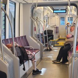 METRO light rail - Looks as though they're running a free hotel on just about any given rail car.