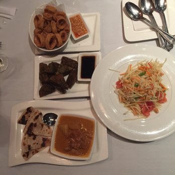 BKNY Thai Restaurant - Appetizers: calamari (top), vegetarian cakes, roti & messalam (bottom), papaya salad (right) - Thai Near Me - Bayside, New York BKNY Thai Restaurant - Appetizers: calamari (top), vegetarian cakes, roti & messalam (bottom), papaya salad (right) - Thai Near Me - Bayside, New York