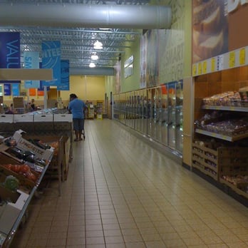 ALDI - a man walking down a grocery aisle - Grocery Near Me - West Haven, Connecticut