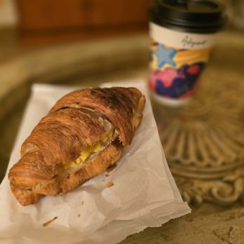 Artigiano - Hornby - Egg & Cheese Croissant and soy milk latte - Coffee & Tea Near Me - Vancouver, British Columbia Artigiano - Hornby - Egg & Cheese Croissant and soy milk latte - Coffee & Tea Near Me - Vancouver, British Columbia