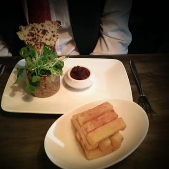 Roast And Conch - Mac and cheese pie with fries cooked in cocoa butter. - Caribbean Near Me - Leeds, XWY