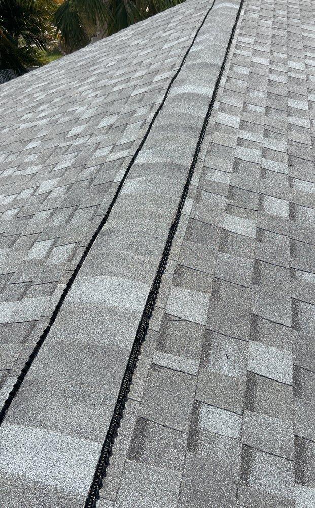 Slide of S F Roofing Quest