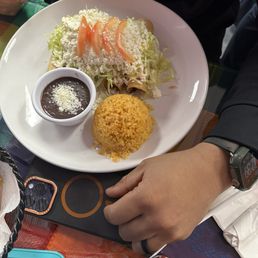 Chicken flautas with rice and beans
