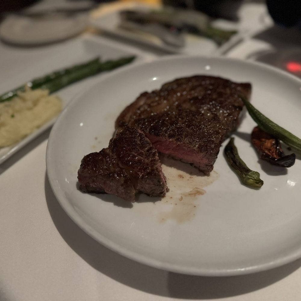 High Cotton - Prime rib steak medium rare with mashed potatoes and asparagus. - Cocktail Bars Near Me - Charleston, South Carolina High Cotton - Prime rib steak medium rare with mashed potatoes and asparagus. - Cocktail Bars Near Me - Charleston, South Carolina