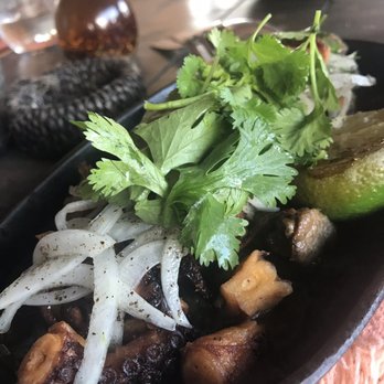 Punta Corcho - Chicharron octopus. The octopus was good and the sauce, there's a lot of steak too in it, which was okay but I preferred the octopus. - Seafood Near Me - Benito Juárez, ROO