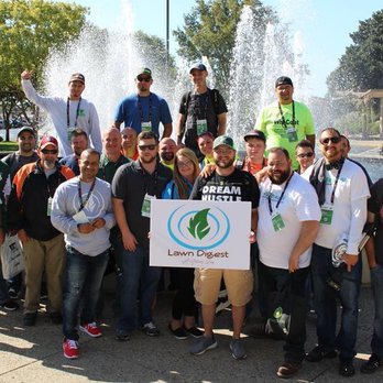The Lawn Pros - a group of people standing in front of a fountain - Lawn Services Near Me - Alliance, Ohio The Lawn Pros - a group of people standing in front of a fountain - Lawn Services Near Me - Alliance, Ohio