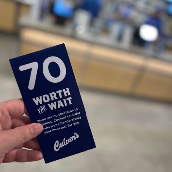 Culver's - a hand holding a book with the number 70 worth the wait - Burgers Near Me - North Charleston, South Carolina