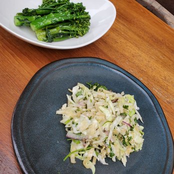 Tommy Bahama Restaurant - Island slaw ($8) in the foreground, roasted broccolini ($8) behind. - Cocktail Bars Near Me - Jupiter, Florida Tommy Bahama Restaurant - Island slaw ($8) in the foreground, roasted broccolini ($8) behind. - Cocktail Bars Near Me - Jupiter, Florida