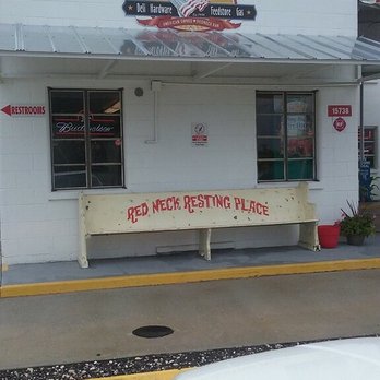 DesChamps Corner - a bench in front of a restaurant - Gas Stations Near Me - Brooksville, Florida