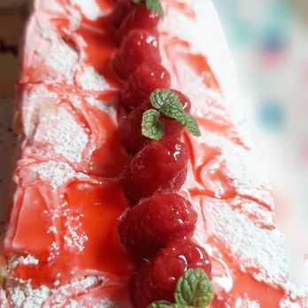 French Pastry by Sandrine - strawberries and powdered sugar - Desserts Near Me French Pastry by Sandrine - strawberries and powdered sugar - Desserts Near Me