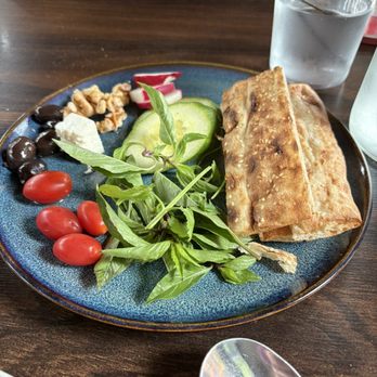 Persian Basket Kitchen & Bar - Bread herbs and cheese - Persian/Iranian Near Me - Johns Creek, Georgia Persian Basket Kitchen & Bar - Bread herbs and cheese - Persian/Iranian Near Me - Johns Creek, Georgia