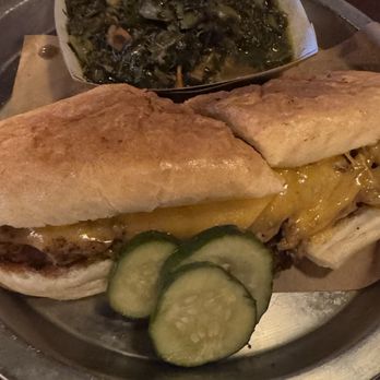 Dinosaur Bar-B-Que - Brisket cheesesteak with simmered greens. - Barbeque Near Me - Rochester, New York