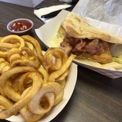 Mckinney Station - The Best Wedgie (Fried Chicken, Bacon, Lettuce, Tomato, Thousand Island dressing) and curly fries
