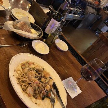 Portofino Trattoria - We ate at the bar with a good bottle of wine and warm bread (olive oil and cheese). Heaven! - Wine Bars Near Me - St. Charles, Illinois