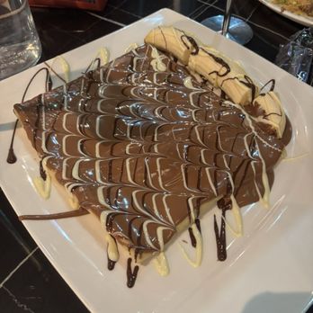 Melt n Dip - Triple chocolate crepe with a side of banana - Desserts Near Me - Orlando, Florida