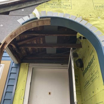 Northstar Restorations - Solid solution to the arch over front door. - Roofing Near Me Northstar Restorations - Solid solution to the arch over front door. - Roofing Near Me