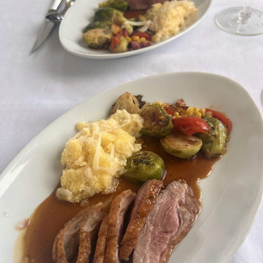 Hwy 150 Bistro - Duck breast and polenta - New American Near Me - El Prado, New Mexico Hwy 150 Bistro - Duck breast and polenta - New American Near Me - El Prado, New Mexico
