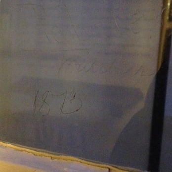 Pickerel Inn - Look close- you can see 1873 carved into the window by a gentlemen high on opium, who then burned himself to death in the alley - Pubs Near Me - Cambridge, CAM