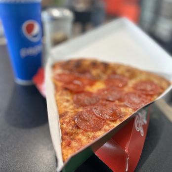 Troy's Italian Kitchen - Pizza slice pepperoni - Pizza Near Me - Arlington, Virginia Troy's Italian Kitchen - Pizza slice pepperoni - Pizza Near Me - Arlington, Virginia