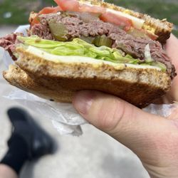 Palm Tree Gourmet - Roast beef Provolone Tomato Pickle Sweet peppers Lettuce On toasted rye with spicy mustard