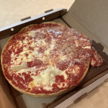 Lou Malnati's Pizzeria - Spilled Deep Dish Cheese - Pizza Near Me - Gurnee, Illinois Lou Malnati's Pizzeria - Spilled Deep Dish Cheese - Pizza Near Me - Gurnee, Illinois