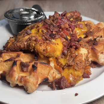 Valley Bistro - This was chicken and waffles with bacon, cheese, and there was syrup in that black container - Breakfast & Brunch Near Me - Enola, Pennsylvania