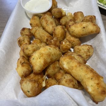 Zeller’s Riverside Bar & Grill - fried garlic cheese curds... so good - Bars Near Me - Otis, Oregon