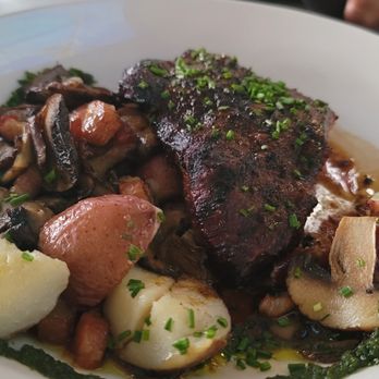 Marker 14 - Flat Iron Steak, hold the coffee encrusting, roasted potato hash, onion, mushroom, bacon and red chilli demi. - Restaurants Near Me - Saugatuck, Michigan Marker 14 - Flat Iron Steak, hold the coffee encrusting, roasted potato hash, onion, mushroom, bacon and red chilli demi. - Restaurants Near Me - Saugatuck, Michigan