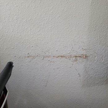 Super 8 by Wyndham Ida Grove - The wall next to the desk chair. - Hotels Near Me - Ida Grove, Iowa