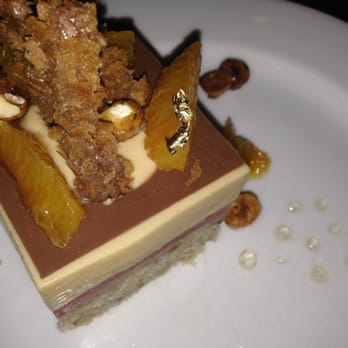 Parc - Gateau: a rich cake, typically one containing layers of cream or fruit. Chocolate with oranges to accompany it and layers includ - French Near Me - Philadelphia, Pennsylvania Parc - Gateau: a rich cake, typically one containing layers of cream or fruit. Chocolate with oranges to accompany it and layers includ - French Near Me - Philadelphia, Pennsylvania