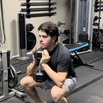 Precision Fitness - Anthony doing goblet squats - Trainers Near Me - McAllen, Texas Precision Fitness - Anthony doing goblet squats - Trainers Near Me - McAllen, Texas