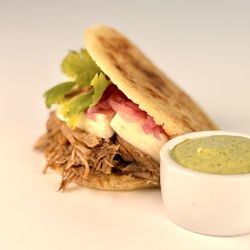 Amara Chocolate & Coffee - Gluten Free Pork, Mano Cheese and Cilantro Arepa!